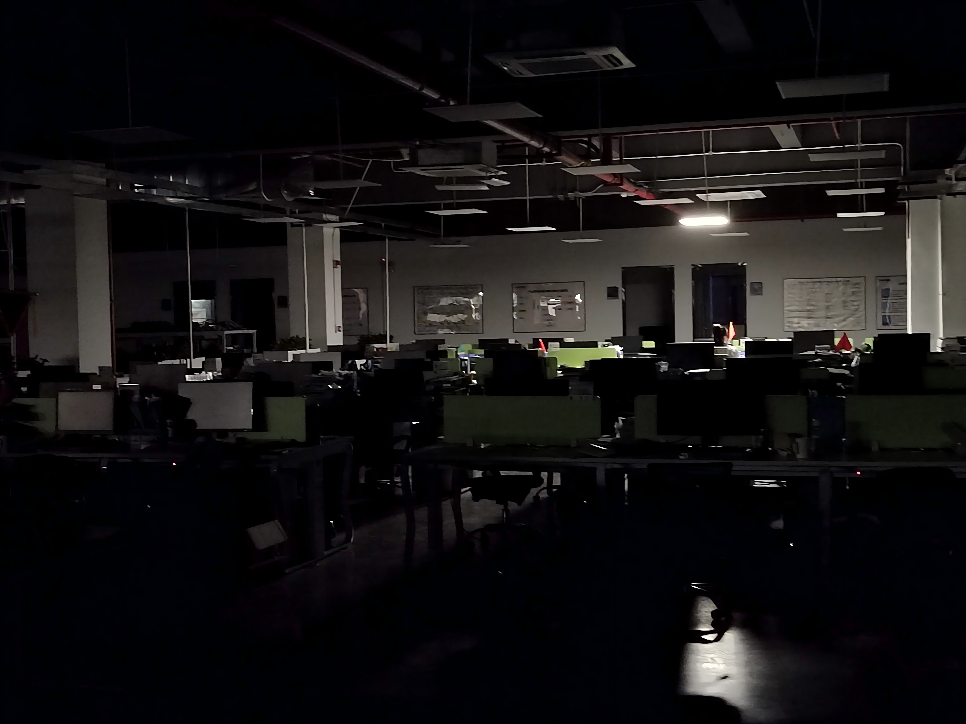Office lighting scene showing automatic energy saving with motion sensor control when no occupants are detected