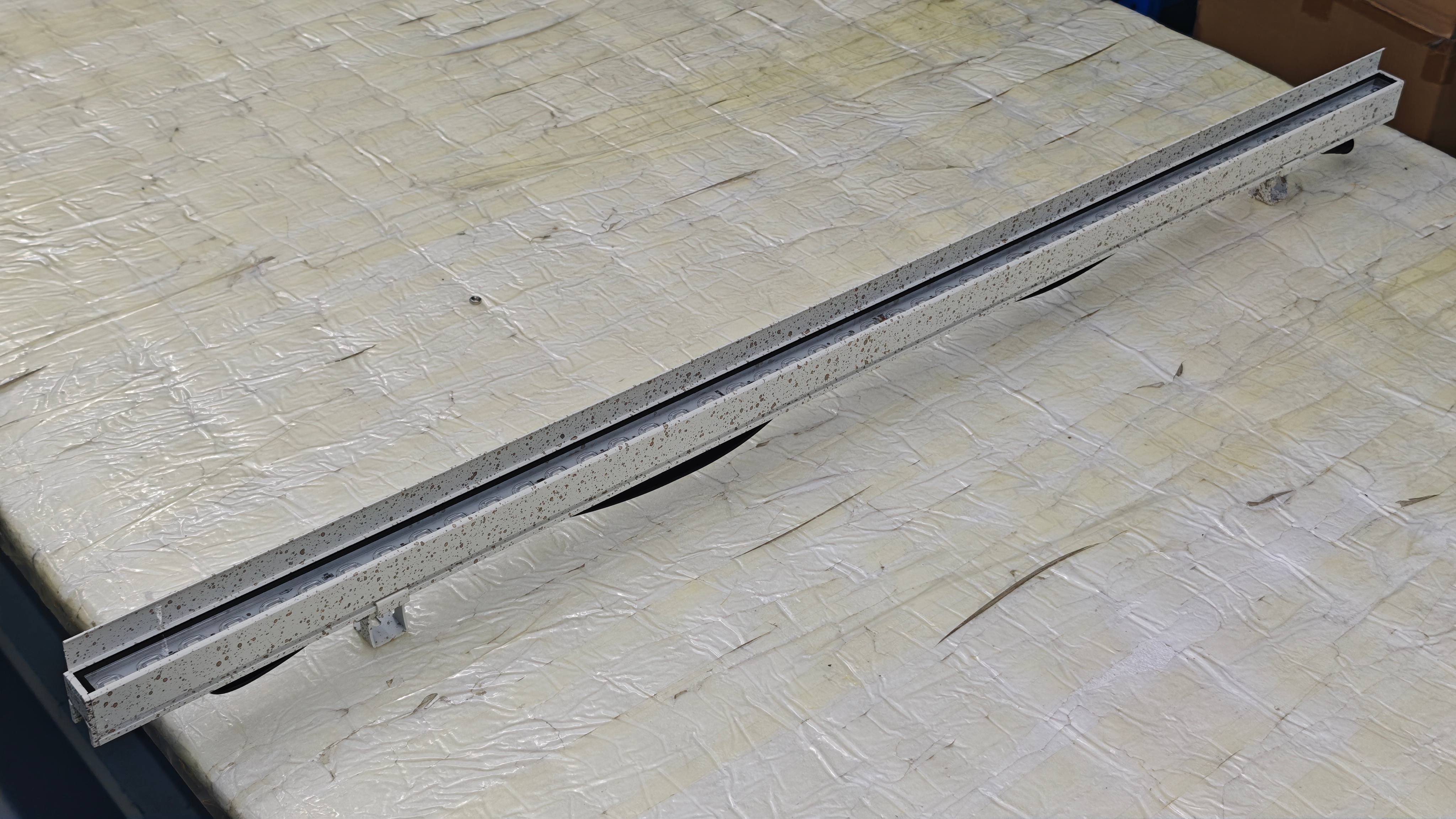 Custom marble-finish linear LED fixture, 48 LEDs per meter, 12W/m, RGBW with tempered glass and side light shield